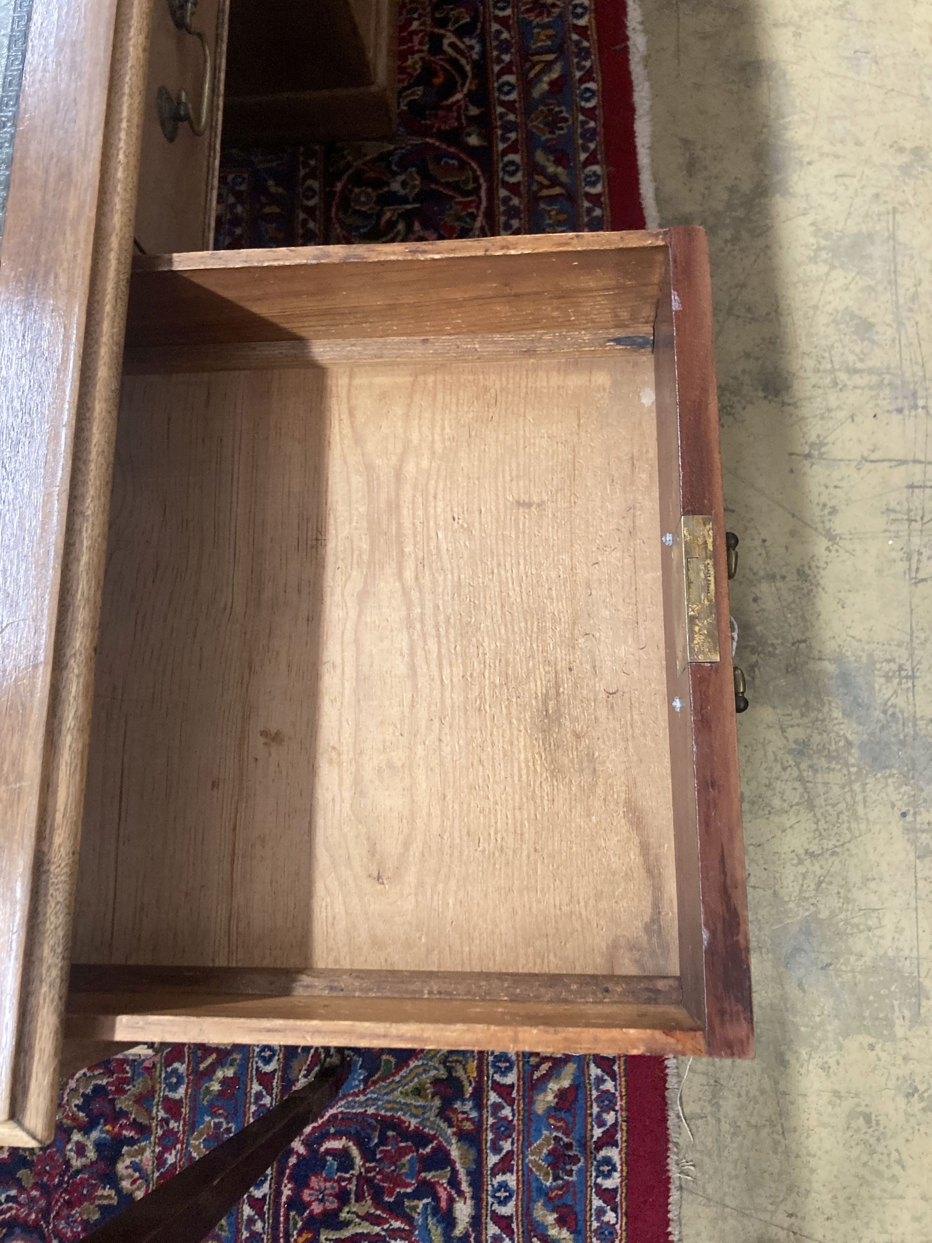 An early 20th century George III style mahogany pedestal desk, width 150cm, depth 81cm, height 76cm